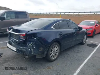 2017 Mazda 6 Sport with VIN JM1GL1U51H1156104, listed as a IAAI auction lot 41769388 with 121,405 mi miles and . Bid and sale history available at DreamBid. Image 4.