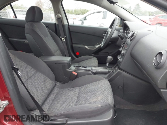 2009 Pontiac G6 1SA with VIN 1G2ZG57BX94120938, listed as a IAAI auction lot 42080712 with 83,343 mi miles and . Bid and sale history available at DreamBid. Image 5.
