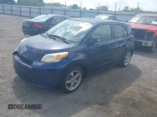 2008 Scion xD with VIN JTKKU10448J004492, listed as a IAAI auction lot 42071070 with 198,787 mi miles. Bid and sale history available at carsss.com. Image 2.