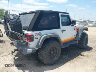 2018 Jeep Wrangler Sport with VIN 1C4GJXAN8JW302519, listed as a IAAI auction lot 42331871 with 51,639 mi miles and . Bid and sale history available at DreamBid. Image 4.