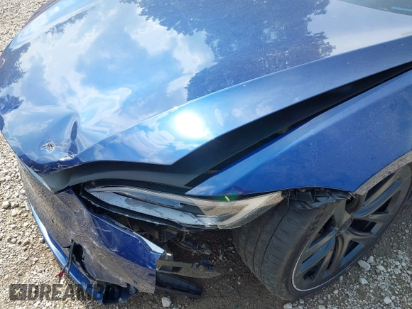 2022 Tesla Model S with VIN 5YJSA1E55NF486443, listed as a IAAI auction lot 42720110 with Not provided miles and . Bid and sale history available at DreamBid. Image 6.