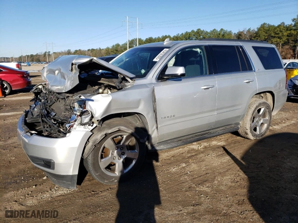 2016 Chevrolet Tahoe LS with VIN 1GNSCAKC1GR478325, listed as a Copart auction lot 43450305 with 179,700 mi miles and Salvage Title. Bid and sale history available at carsss.com. Image 1.