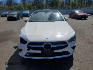 2020 Mercedes-Benz CLA 250 with VIN WDD5J4HB4LN077693, listed as a Copart auction lot 56899695 with 26,656 mi miles and Salvage title. Bid and sale history available at DreamBid. Image 5.