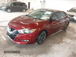 2016 Nissan Maxima 3.5 SV with VIN 1N4AA6APXGC445036, listed as a IAAI auction lot 41660079 with 119,287 mi miles. Bid and sale history available at carsss.com. Image 2.