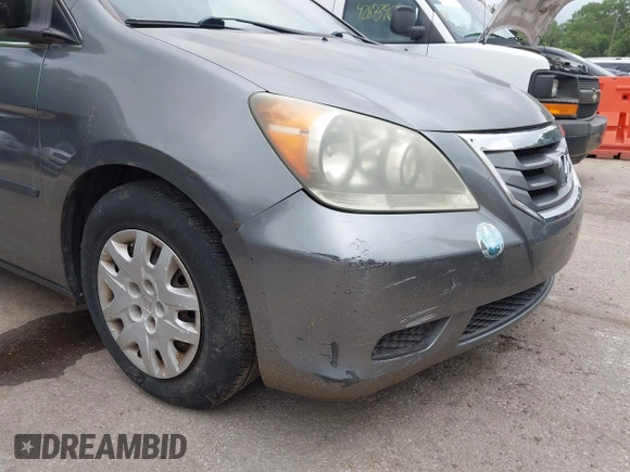 2009 Honda Odyssey LX with VIN 5FNRL38269B043326, listed as a IAAI auction lot 42872714 with 235,087 mi miles and . Bid and sale history available at DreamBid. Image 13.