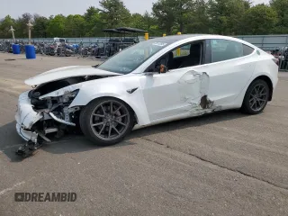 2020 Tesla Model 3 Long Range z VIN 5YJ3E1EB4LF744477, wystawiony jako Copart lot #59518595 z przebiegiem 127 805 mil mil oraz Czysty tytuł • Clean title. Historia ofert i sprzedaży dostępna na DreamBid. Obrazek 1.