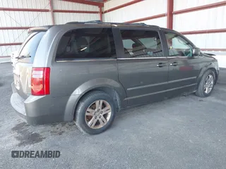 2010 Dodge Grand Caravan SXT with VIN 2D4RN5DX6AR316624, listed as a IAAI auction lot 41943314 with 132,563 mi miles and . Bid and sale history available at DreamBid. Image 4.