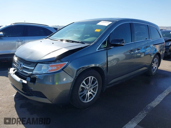 2012 Honda Odyssey EX-L with VIN 5FNRL5H64CB044075, listed as a IAAI auction lot 42094680 with 67,165 mi miles and . Bid and sale history available at carsss.com. Image 17.