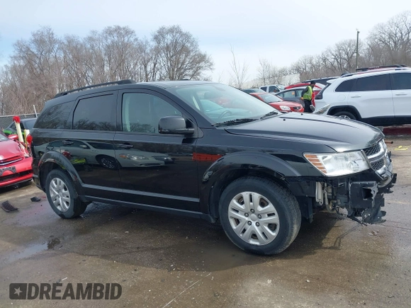 2019 Dodge Journey SE with VIN 3C4PDCBB8KT844800, listed as a IAAI auction lot 41721062 with 148,390 mi miles and . Bid and sale history available at DreamBid. Image 14.