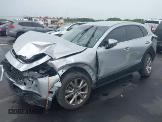 2021 Mazda CX-30 Select with VIN 3MVDMBBLXMM246600, listed as a IAAI auction lot 42418629 with 77,713 mi miles and . Bid and sale history available at DreamBid. Image 2.