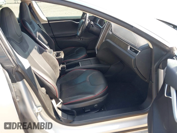 2012 Tesla Model S Performance with VIN 5YJSA1DP3CFP01348, listed as a IAAI auction lot 42185490 with 181,217 mi miles and . Bid and sale history available at DreamBid. Image 5.