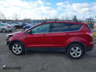 2013 Ford Escape SE with VIN 1FMCU0GX1DUA98986, listed as a IAAI auction lot 41858744 with 105,440 mi miles. Bid and sale history available at carsss.com. Image 15.