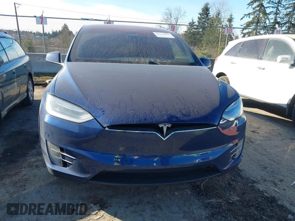 2017 Tesla Model X 90D z VIN 5YJXCBE21HF076514, wystawiony jako IAAI lot #41559020 z przebiegiem 108 573 mil mil oraz . Historia ofert i sprzedaży dostępna na DreamBid. Obrazek 12.