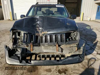 1994 Jeep Grand Cherokee Limited with VIN 1J4GZ78S0RC357283, listed as a Copart auction lot 49236995 with 84,306 mi miles and Salvage title. Bid and sale history available at DreamBid. Image 5.