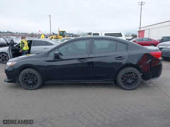 2020 Subaru Impreza with VIN 4S3GKAB68L3607749, listed as a IAAI auction lot 41621209 with 90,648 mi miles. Bid and sale history available at carsss.com. Image 14.