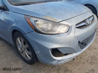 2012 Hyundai Accent SE with VIN KMHCU5AE2CU019828, listed as a IAAI auction lot 41904860 with 151,171 mi miles. Bid and sale history available at carsss.com. Image 6.