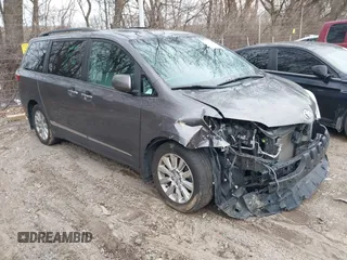 2015 Toyota Sienna Ltd with VIN 5TDDK3DCXFS100341, listed as a IAAI auction lot 41245558 with 114,854 mi miles. Bid and sale history available at carsss.com. Image 1.