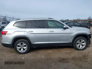 2018 Volkswagen Atlas SE with VIN 1V2KR2CA6JC560411, listed as a IAAI auction lot 41887472 with 168,155 mi miles and . Bid and sale history available at DreamBid. Image 14.