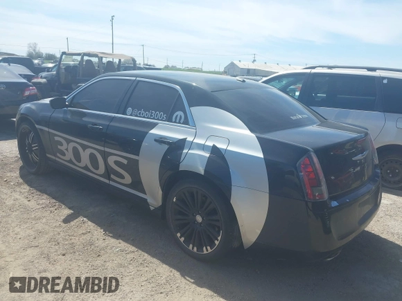 2013 Chrysler 300 with VIN 2C3CCABG1DH709935, listed as a IAAI auction lot 41814279 with 101,174 mi miles. Bid and sale history available at carsss.com. Image 3.