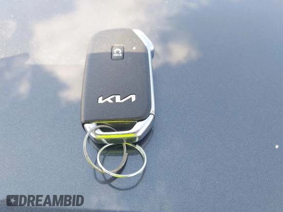2023 Kia Sportage EX with VIN KNDPVCAG2P7046184, listed as a IAAI auction lot 42212231 with 25,212 mi miles and . Bid and sale history available at DreamBid. Image 11.