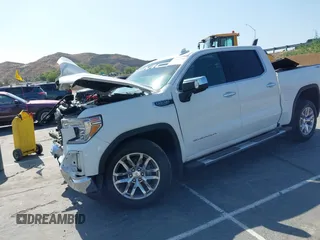 2022 GMC Sierra 1500 SLT with VIN 3GTU9DED3NG156904, listed as a IAAI auction lot 42429722 with 59,717 mi miles and . Bid and sale history available at DreamBid. Image 2.