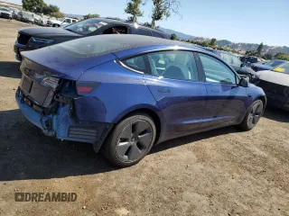 2022 Tesla Model 3 with VIN 5YJ3E1EA0NF361050, listed as a Copart auction lot 62446144 with 38,808 mi miles and Salvage Title. Bid and sale history available at carsss.com. Image 3.