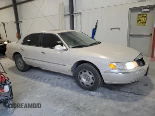 2002 Lincoln Continental with VIN 1LNHM97VX2Y694578, listed as a Copart auction lot 42245705 with 195,236 mi miles and Salvage Title. Bid and sale history available at carsss.com. Image 4.