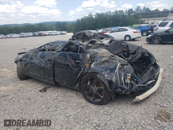 2004 Cadillac CTS-V z VIN 1G6DN57S940153332, wystawiony jako Copart lot #61662674 z przebiegiem Nie podano mil oraz Szkoda całkowita • Salvage title. Historia ofert i sprzedaży dostępna na DreamBid. Obrazek 2.