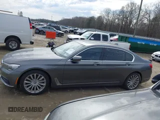 2017 BMW 7 Series 740i with VIN WBA7E2C54HG740170, listed as a IAAI auction lot 41432578 with 110,893 mi miles and . Bid and sale history available at DreamBid. Image 14.