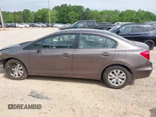 2012 Honda Civic LX with VIN 2HGFB2F57CH528266, listed as a IAAI auction lot 42094846 with 120,244 mi miles and . Bid and sale history available at DreamBid. Image 14.