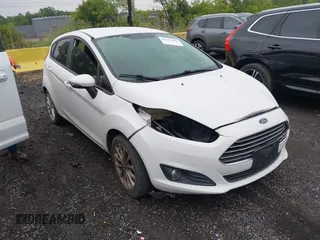 2014 Ford Fiesta SE z VIN 3FADP4EJ3EM116776, wystawiony jako IAAI lot #42325282 z przebiegiem 130 315 mil mil oraz . Historia ofert i sprzedaży dostępna na DreamBid. Obrazek 1.