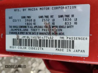 2011 Mazda 3 i Touring with VIN JM1BL1VG8B1477462, listed as a Copart auction lot 53268995 with 118,510 mi miles and Salvage Title. Bid and sale history available at DreamBid. Image 12.
