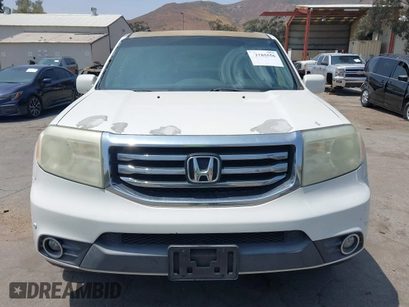 2013 Honda Pilot Touring with VIN 5FNYF3H93DB017954, listed as a IAAI auction lot 42185556 with 174,929 mi miles and . Bid and sale history available at carsss.com. Image 12.