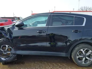 2020 Kia Sportage LX z VIN KNDPM3AC2L7751562, wystawiony jako IAAI lot #41611826 z przebiegiem 100 756 mil mil oraz . Historia ofert i sprzedaży dostępna na DreamBid. Obrazek 14.