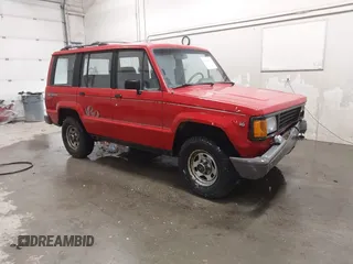 1991 Isuzu Trooper z VIN JACCH58R6M8905869, wystawiony jako IAAI lot #42394651 z przebiegiem 117 130 mil mil oraz . Historia ofert i sprzedaży dostępna na DreamBid. Obrazek 1.