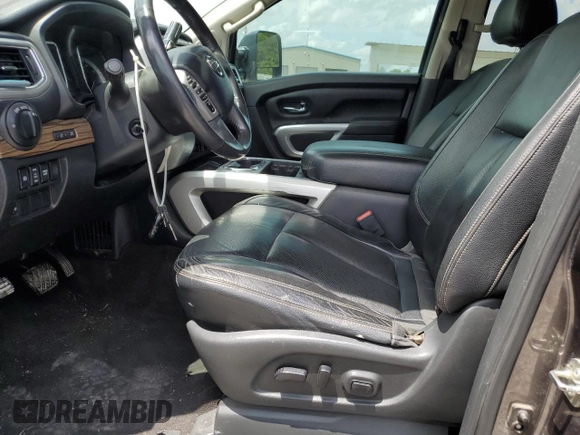 2017 Nissan Titan SL z VIN 1N6BA1F27HN547900, wystawiony jako Copart lot #61768145 z przebiegiem 148 383 mil mil oraz Szkoda całkowita • Salvage title. Historia ofert i sprzedaży dostępna na DreamBid. Obrazek 7.