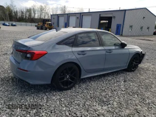2023 Honda Civic Sport z VIN 2HGFE2F50PH528025, wystawiony jako Copart lot #54514405 z przebiegiem 15 504 mil mil oraz Szkody całkowita. Historia ofert i sprzedaży dostępna na DreamBid. Obrazek 3.