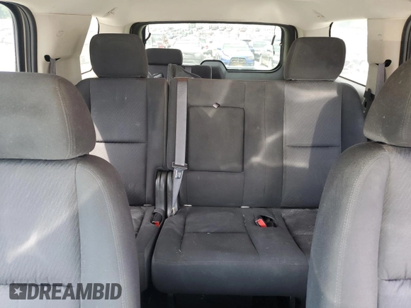 2013 Chevrolet Tahoe LS с VIN 1GNSKAE07DR306462, выставлен на аукционе Copart как лот 55029885 с пробегом 158 173 миль миль и Списание • Salvage title. История ставок и продаж доступна на DreamBid. Изображение 10.
