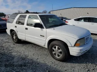 1999 Oldsmobile Bravada z VIN 1GHDT13W8X2717155, wystawiony jako Copart lot #84807244 z przebiegiem 144 805 mil mil oraz Szkoda całkowita • Salvage title. Historia ofert i sprzedaży dostępna na DreamBid. Obrazek 4.