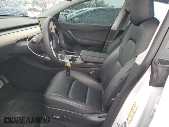 2022 Tesla Model Y Long Range with VIN 7SAYGAEE6NF506405, listed as a Copart auction lot 50392655 with 36,866 mi miles and Salvage Title. Bid and sale history available at DreamBid. Image 7.
