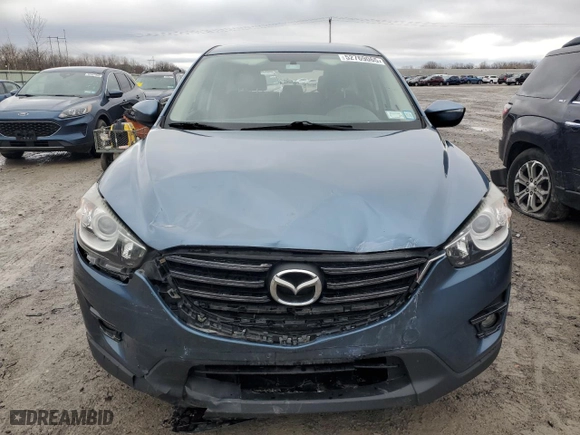 2016 Mazda CX-5 Touring with VIN JM3KE4CY4G0778032, listed as a Copart auction lot 52769065 with 81,443 mi miles and Salvage Title. Bid and sale history available at carsss.com. Image 5.