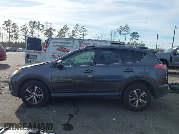 2018 Toyota RAV4 XLE with VIN JTMWFREV1JJ169926, listed as a IAAI auction lot 41464920 with 111,144 mi miles. Bid and sale history available at carsss.com. Image 14.