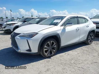 2021 Lexus UX with VIN JTHP9JBH4M2044900, listed as a IAAI auction lot 40543882 with 1 mi miles. Bid and sale history available at carsss.com. Image 2.