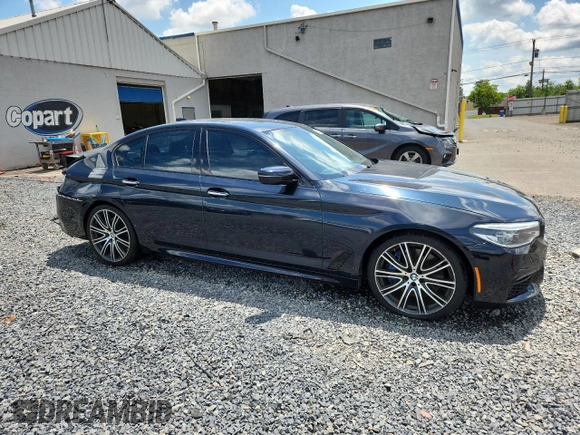 2017 BMW 5 Series 540i with VIN WBAJE5C31HG916954, listed as a Copart auction lot 63770695 with 81,546 mi miles and Salvage title. Bid and sale history available at DreamBid. Image 4.