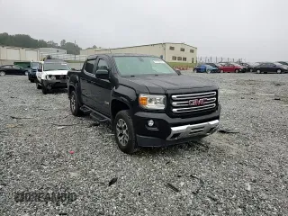 2015 GMC Canyon 4WD SLE with VIN 1GTG6BE37F1157166, listed as a Copart auction lot 71279914 with 114,484 mi miles and Salvage Title. Bid and sale history available at carsss.com. Image 11.