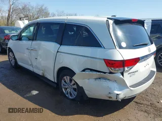 2016 Honda Odyssey EX-L with VIN 5FNRL5H68GB160563, listed as a IAAI auction lot 41962881 with 121,429 mi miles. Bid and sale history available at carsss.com. Image 3.