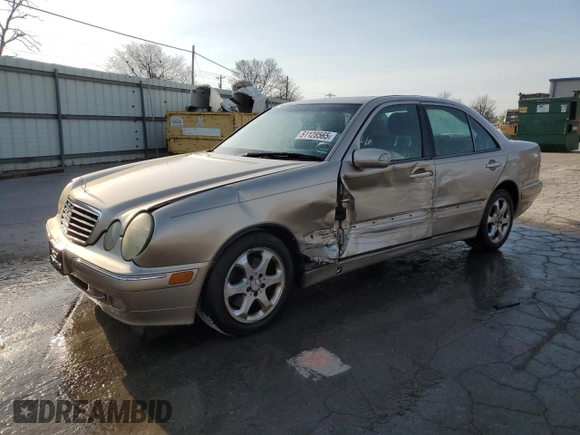 2002 Mercedes-Benz E-Class with VIN WDBJF65J22B490275, listed as a Copart auction lot 51128565 with 142,232 mi miles and Salvage Title. Bid and sale history available at carsss.com. Image 1.
