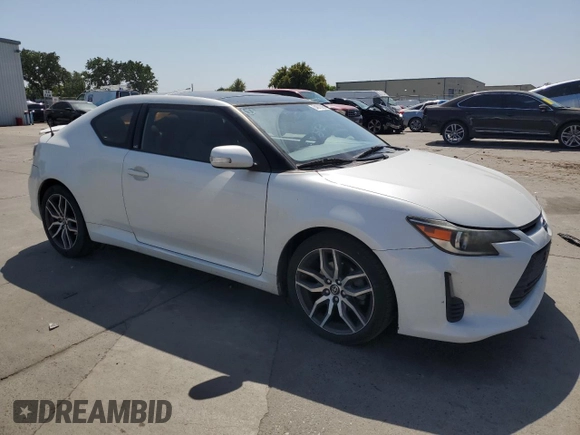 2015 Scion tC with VIN JTKJF5C7XF3092825, listed as a Copart auction lot 54870395 with 130,963 mi miles and Clean Title. Bid and sale history available at carsss.com. Image 4.