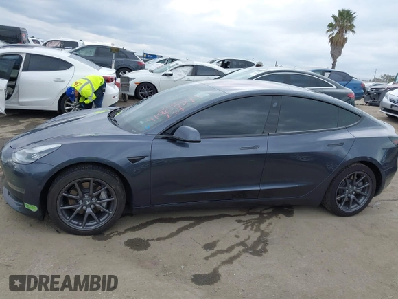 2018 Tesla Model 3 Long Range Battery with VIN 5YJ3E1EA0JF101564, listed as a IAAI auction lot 41902214 with 101,581 mi miles. Bid and sale history available at carsss.com. Image 14.