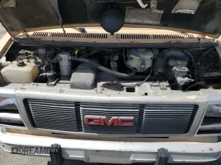 1992 GMC Vandura z VIN 2GTGG39K7N4508329, wystawiony jako Copart lot #56752215 z przebiegiem 248 713 mil mil oraz Tytuł czysty. Historia ofert i sprzedaży dostępna na DreamBid. Obrazek 12.